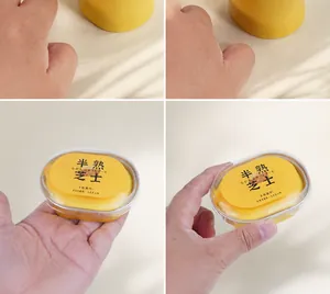 Detailed view of the realistic half-baked cheese slow-rebound squishy toy in packaging