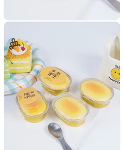 Detailed view of four PU slow rebound cheese cake squishy toys in clear plastic cups.