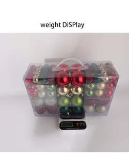 Detailed view of 100pcs Christmas ball ornament gift set showing a total weight of 662g