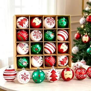 Set of 16 decorative Christmas balls featuring festive patterns and characters in a gift box