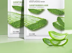 Close-up detail view of Aloe Vera moisturizing face mask with fresh aloe slices on green background