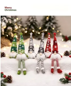 Detailed view of six festive Christmas gnomes with colorful hats on snowy background