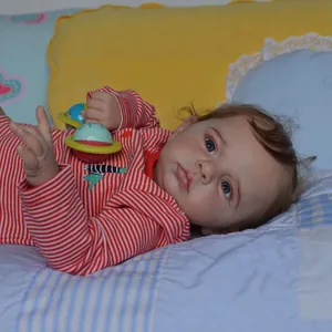 Realistic 60cm reborn baby doll Cameron with handmade 3D skin and striped outfit