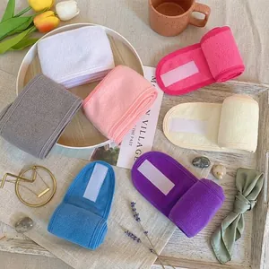 Soft microfiber spa headbands in various colors with an adjustable Velcro closure
