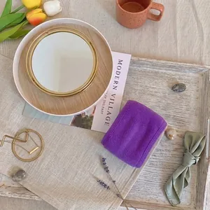 Close-up of a soft purple velcro headband for skincare and makeup routines.
