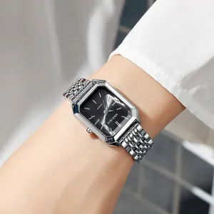 Elegant silver steel strap ladies quartz watch featuring a classic black square dial