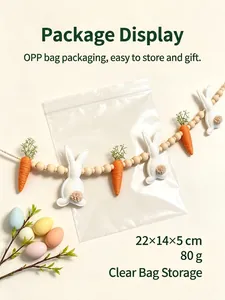 Easter bunny and carrot garland decoration shown inside a transparent OPP storage bag.