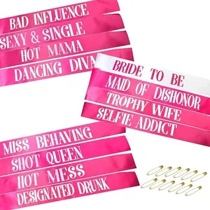 12-piece bachelorette party sash set in pink and white with fun printed slogans