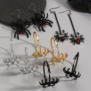 Close-up showcasing assorted gothic spider hoop and dangle earrings for Halloween