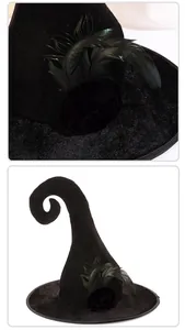 Close-up detail of a black velvet witch hat with a unique curved tip and dark feathers.