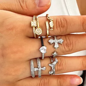 Detailed macro view of fashionable open rings with inlaid zircon and unique design charms