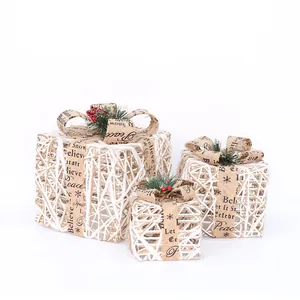 Three-piece set of white wicker Christmas gift boxes with LED lights and burlap bows