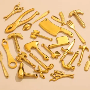 Variety of gold stainless steel tool charms and pendants for DIY jewelry making sets