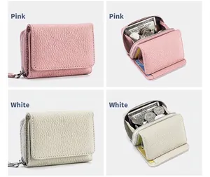 Multifunktionale Mini-RFID-Brieftasche aus rosa und weißem Leder mit Münzfach-Details.