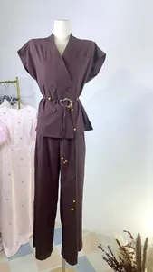 Full-length view of a sleeveless waistcoat and straight-leg trousers set on a mannequin