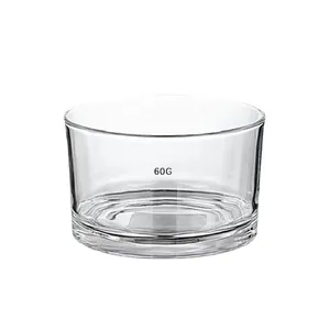 Transparent 60g glass jar for aromatherapy candles, minimal flat cylinder design.