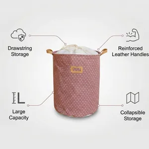 Collapsible cotton linen laundry hamper with drawstring closure and polka dot pattern