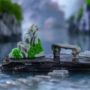 Miniature landscape simulation rockery with green moss and stone bench for garden DIY decor