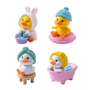 Adorable miniature yellow duck figurines for DIY desktop scene decoration