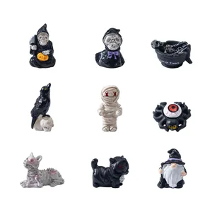 Assorted miniature Halloween resin figurines featuring mummy, crow and grim reaper