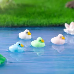 Set of colorful miniature duck figurines for DIY fairy garden and micro landscape decor.