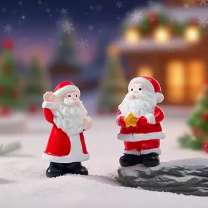 Set of realistic Santa Claus figurines for festive Christmas miniature snowy landscape decor
