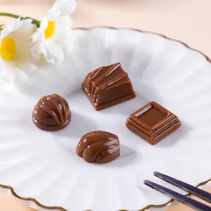 Realistic set of four miniature resin chocolates for creative DIY crafts and decor.