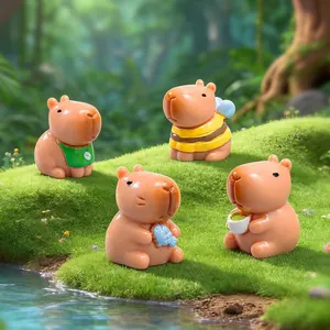 Adorable capybara figurines set in a lush green micro landscape for DIY garden decor