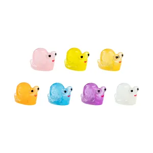 Set of seven mini glow-in-the-dark snail figurines for DIY micro-landscape garden decor