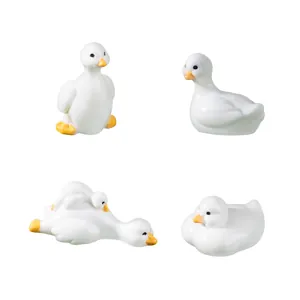 Set of four adorable white chubby duck figurines for gardening DIY landscape decor