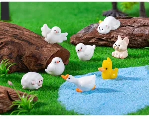 Macro view of miniature resin animals including sheep and geese in a micro landscape