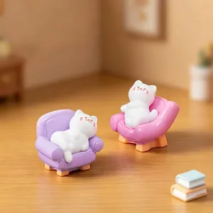 Miniature lazy cat figurines on colorful sofas for dollhouse DIY and desktop decoration