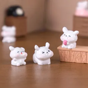 Three cute white puppy miniature figurines for DIY dollhouse and micro landscape decoration.