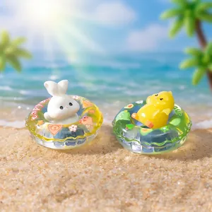 Niedliche Tierfiguren mit leuchtenden Schwimmreifen für Strand-Landschaftsbau