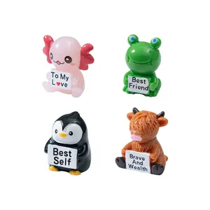 Set of 4 cute miniature animal figurines holding inspirational message signs