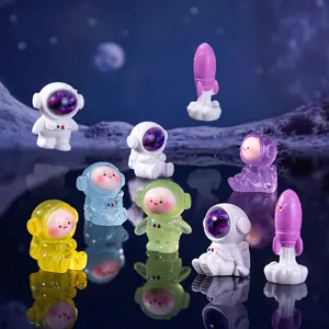 Miniature space-themed astronaut and rocket figurines for DIY landscape decoration