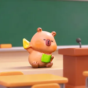 Schattig capibara beeldje met boek en liniaal in een klaslokaal decoratie