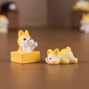 Adorable miniature yellow and white corgi dog figurines for micro landscape DIY crafts