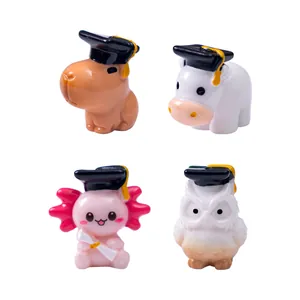 Set of 4 cute resin animal figurines wearing mini graduation caps for micro-landscapes.