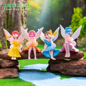 Set of four cute fairy figurines holding LOVE letters for miniature garden and desk decor