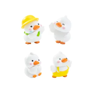 Collection of four cute white duck miniature figurines for micro landscape DIY garden decor