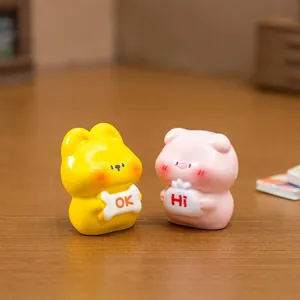Cute pair of yellow and pink cartoon animal figurines for DIY dollhouse and desktop decor