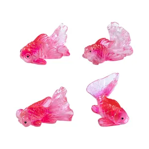 Set van 4 doorschijnende roze miniatuur goudvisfiguren van hars voor microtuinen