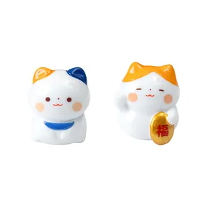 Adorable miniature Japanese lucky cat figurines with gold coin for DIY desktop decor