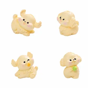 Set di 4 simpatiche figurine di cuccioli di Golden Retriever per decorazioni fai-da-te.