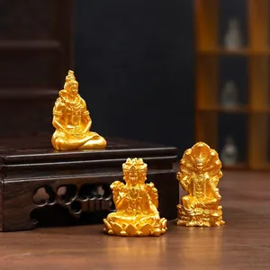 Set of three miniature gold Southeast Asian religious deity figurines for home DIY decor