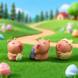 Set of three cute Easter Capybara figurines with colorful eggs in a grass garden setting
