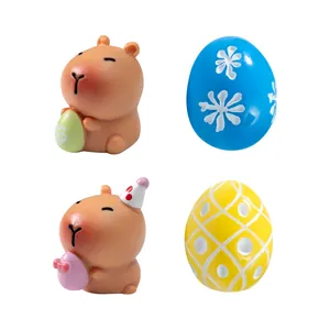 Set of miniature Easter Capybara figurines with colorful decorated eggs for desk decor