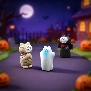 Three cute Halloween cat figurines featuring mummy ghost and bat demon designs for DIY