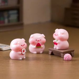 Three cute miniature pig figurines with fruit and donut for DIY dollhouse desktop ornaments